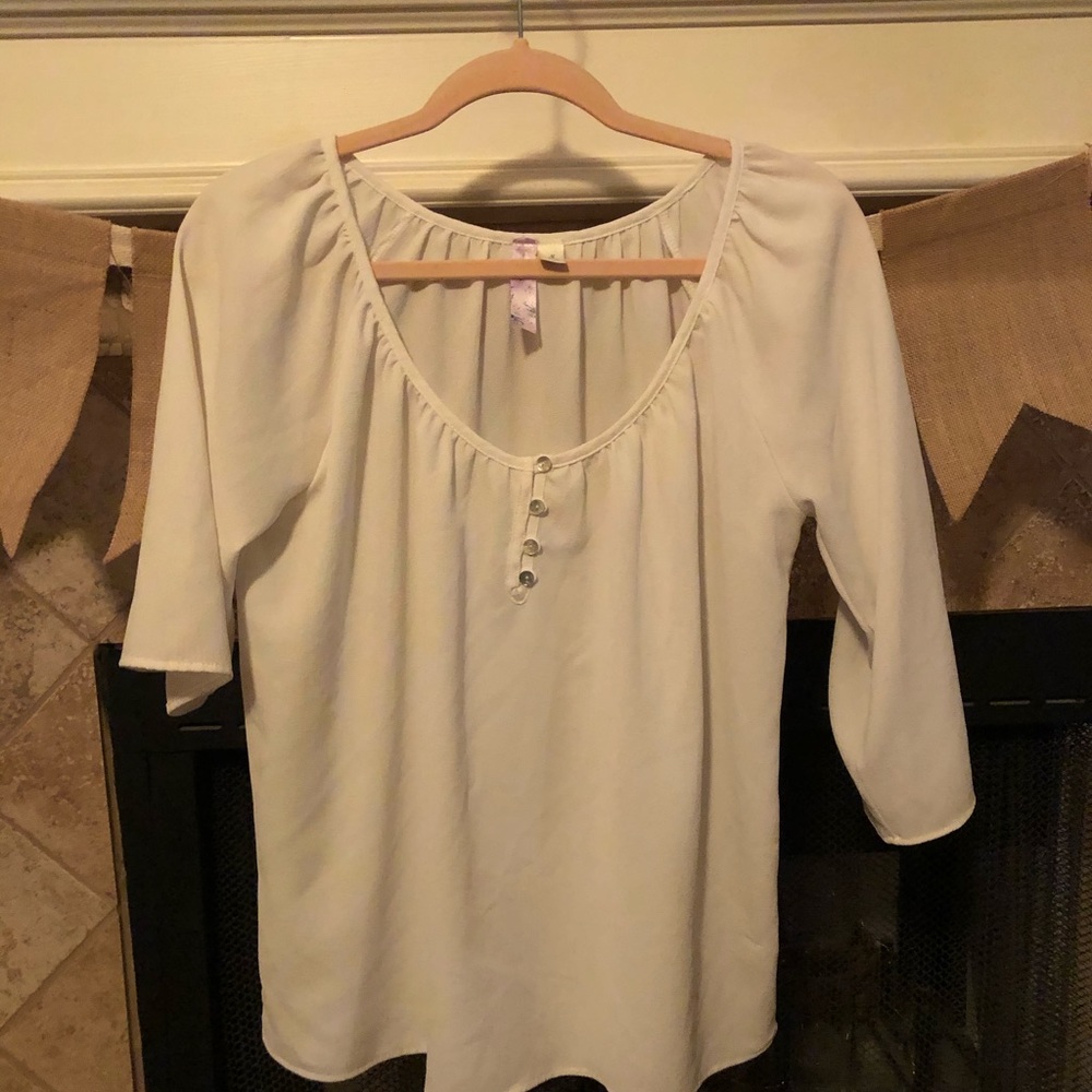 White loose fitting boutique blouse